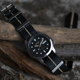 The Cella NATO Strap - Black with Khaki Stripe